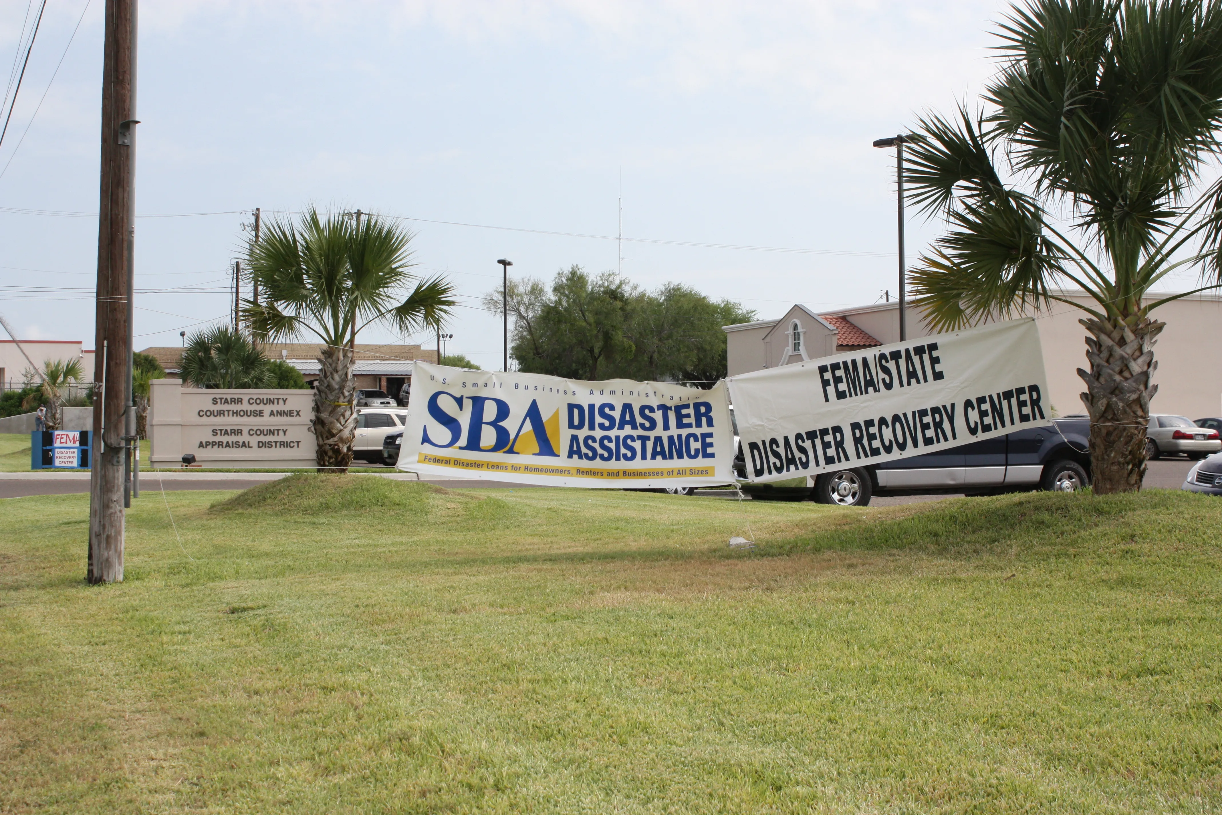 Signs marking a FEMA Disaster Recovery Center where survivors can apply for assistance in person