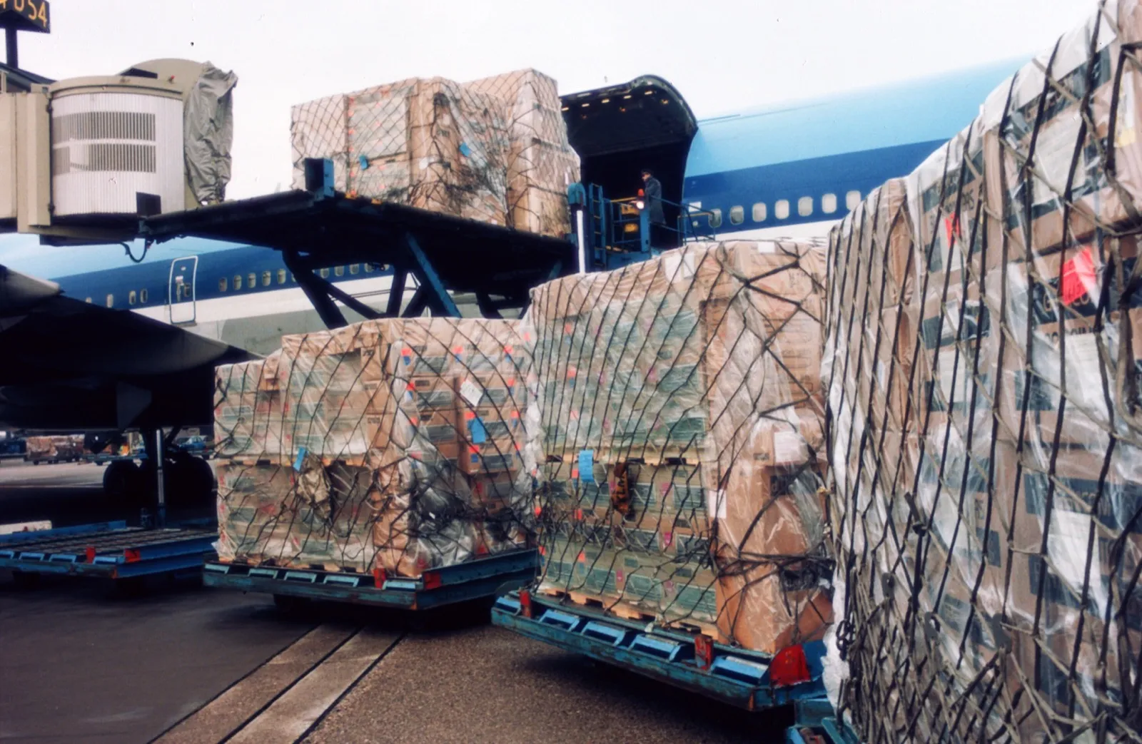 Freight being loaded onto an airliner on an airport ramp