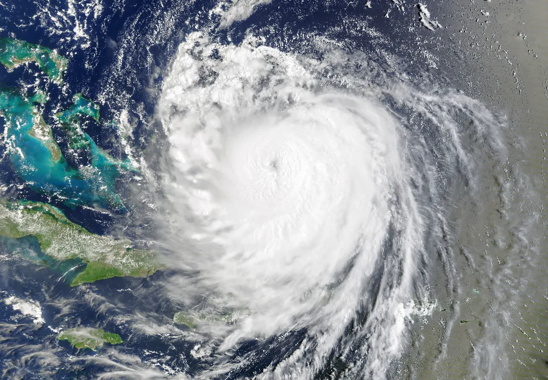 A powerful hurricane churning over the warm open Atlantic Ocean