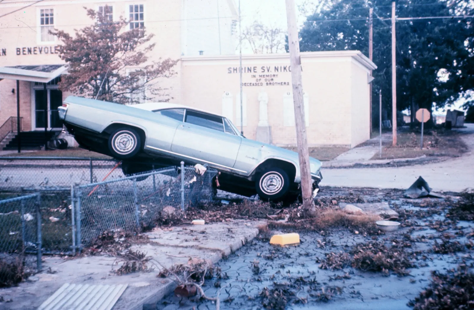 A car thrown onto a fence by Hurricane Camille in Biloxi, Mississippi in 1969