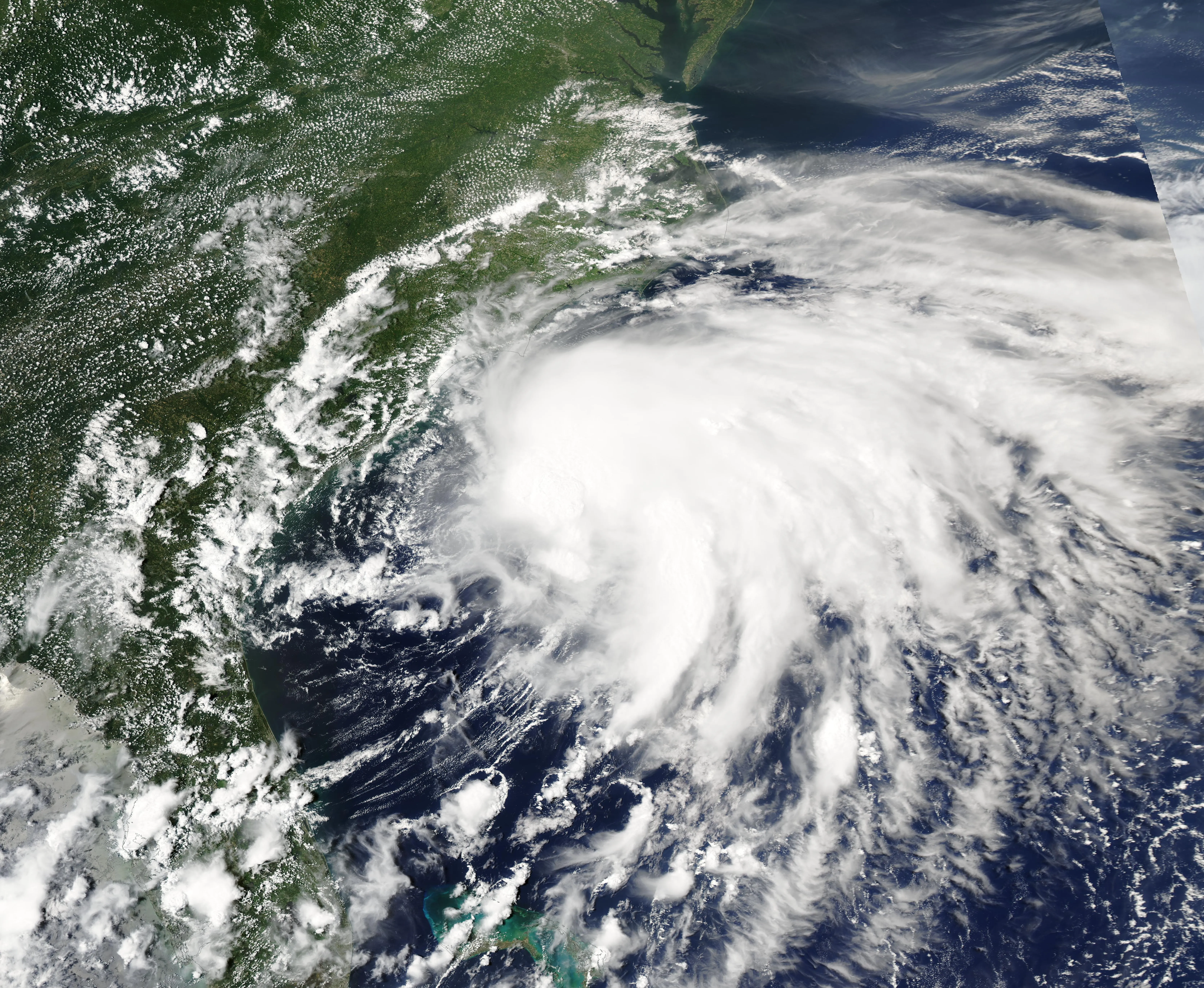 A disorganized tropical storm whose low-level center is exposed and displaced from its main mass of thunderstorms