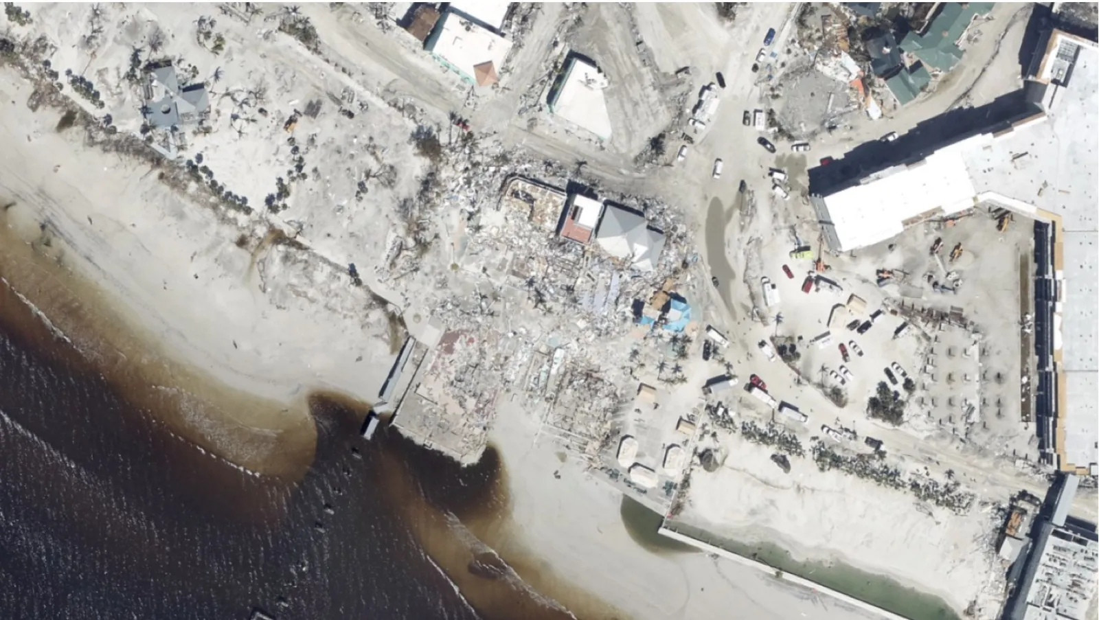 Catastrophic damage in the Times Square district of Fort Myers Beach after Hurricane Ian