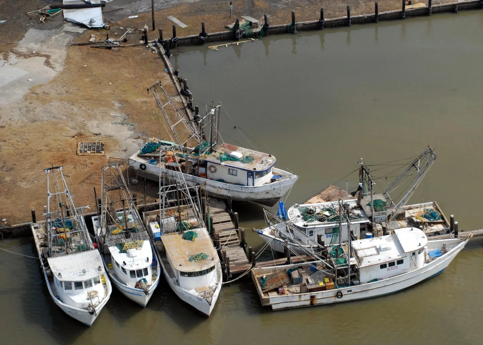 Aerial view of damaged boats at a boatyard on the Bolivar Peninsula after Hurricane Ike