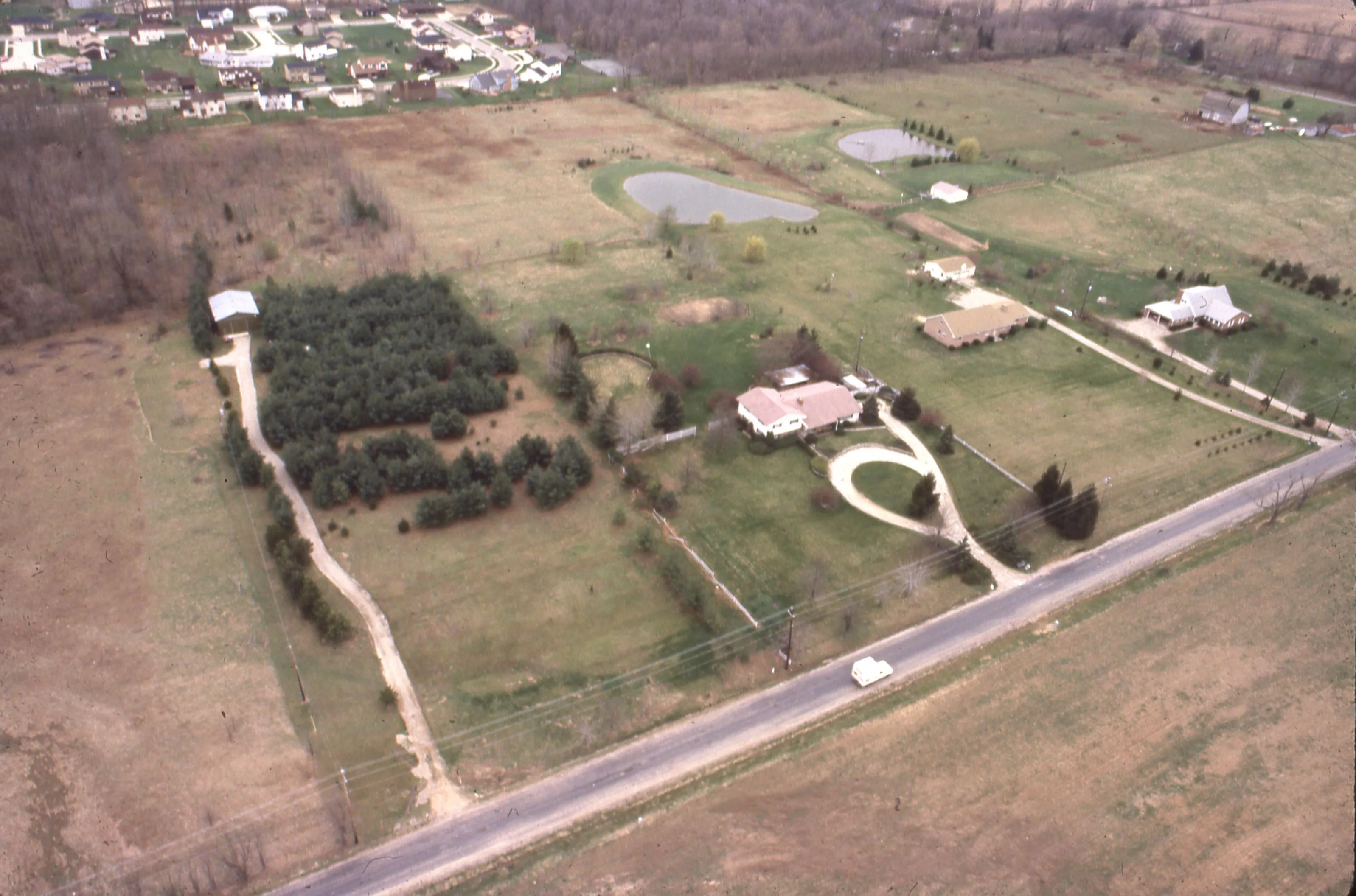 An aerial view of a suburban residential neighborhood