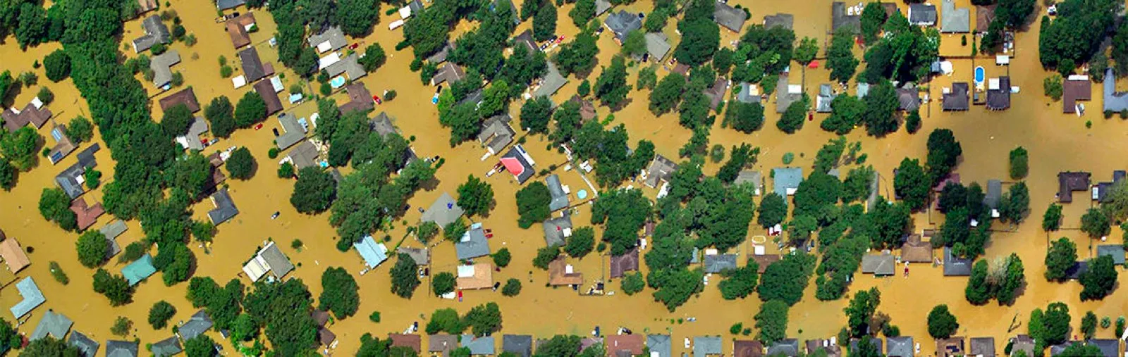 Aerial view of homes surrounded by floodwater in Louisiana
