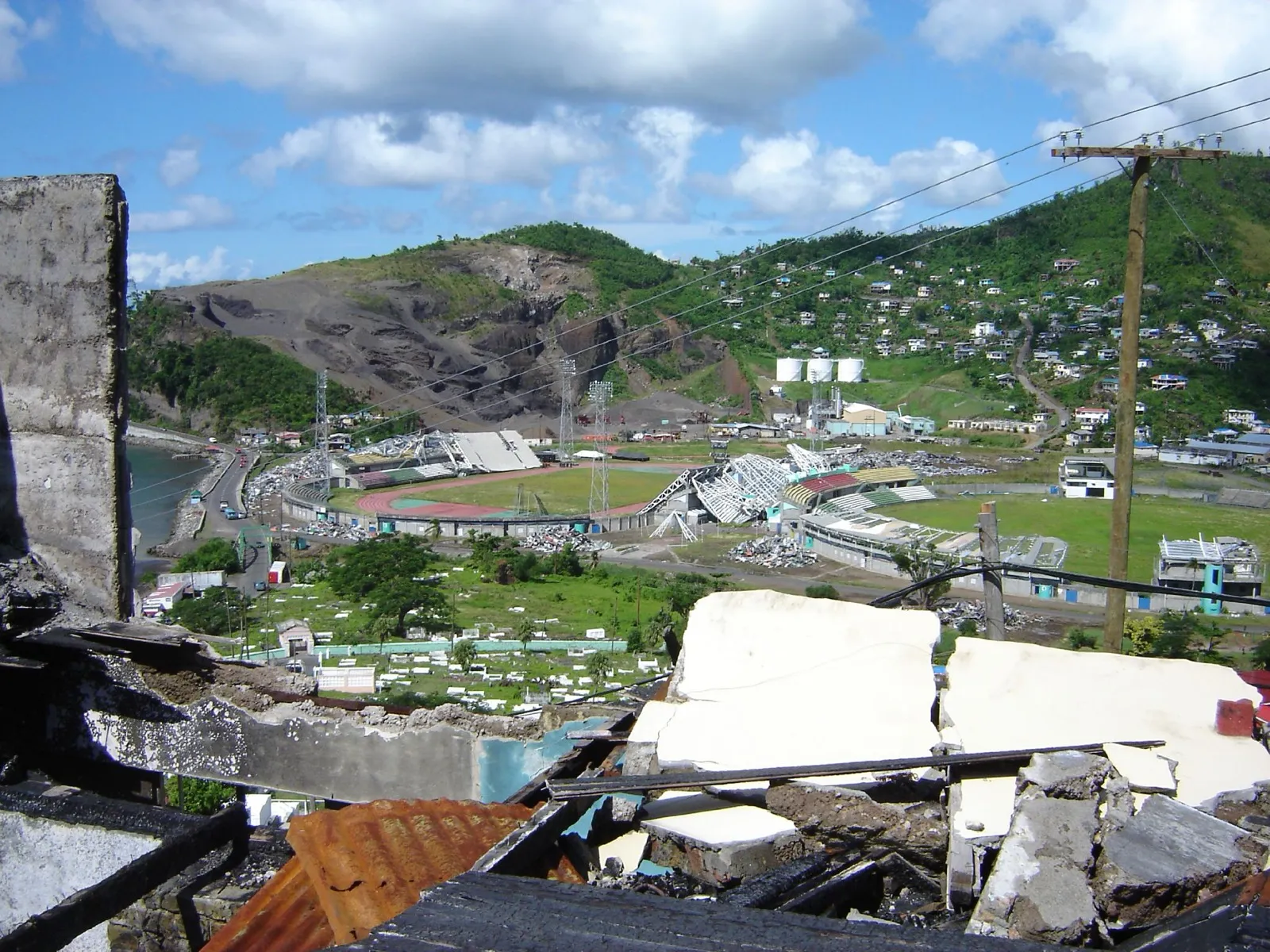 Widespread destruction in Grenada after Hurricane Ivan, including the damaged national stadium