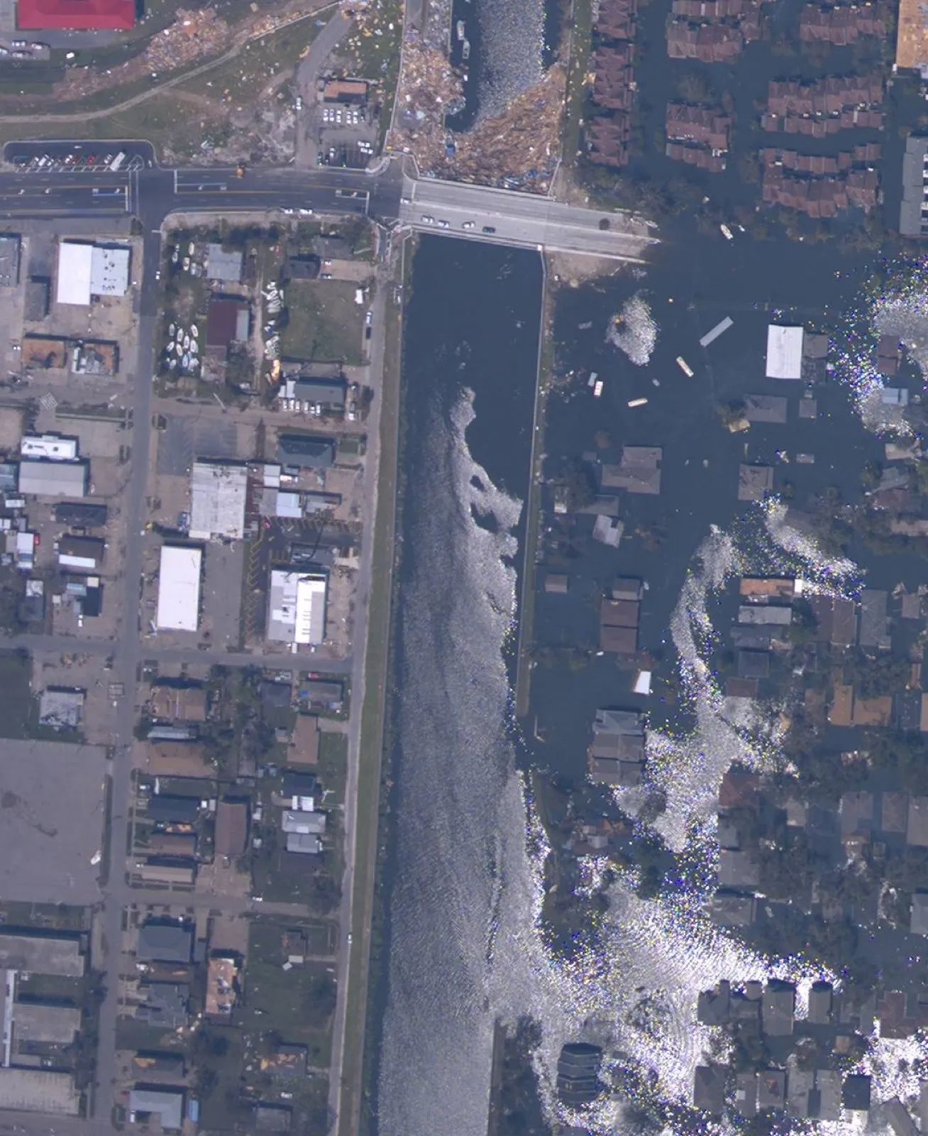 Aerial view of the breached 17th Street Canal floodwall in New Orleans after Hurricane Katrina