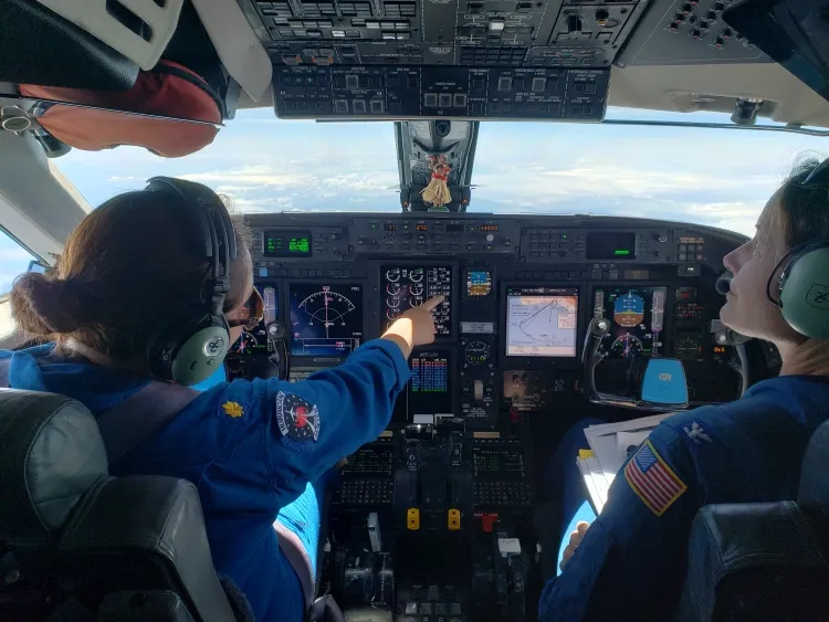 The glass cockpit of NOAA's Gulfstream IV-SP in flight during a hurricane surveillance mission
