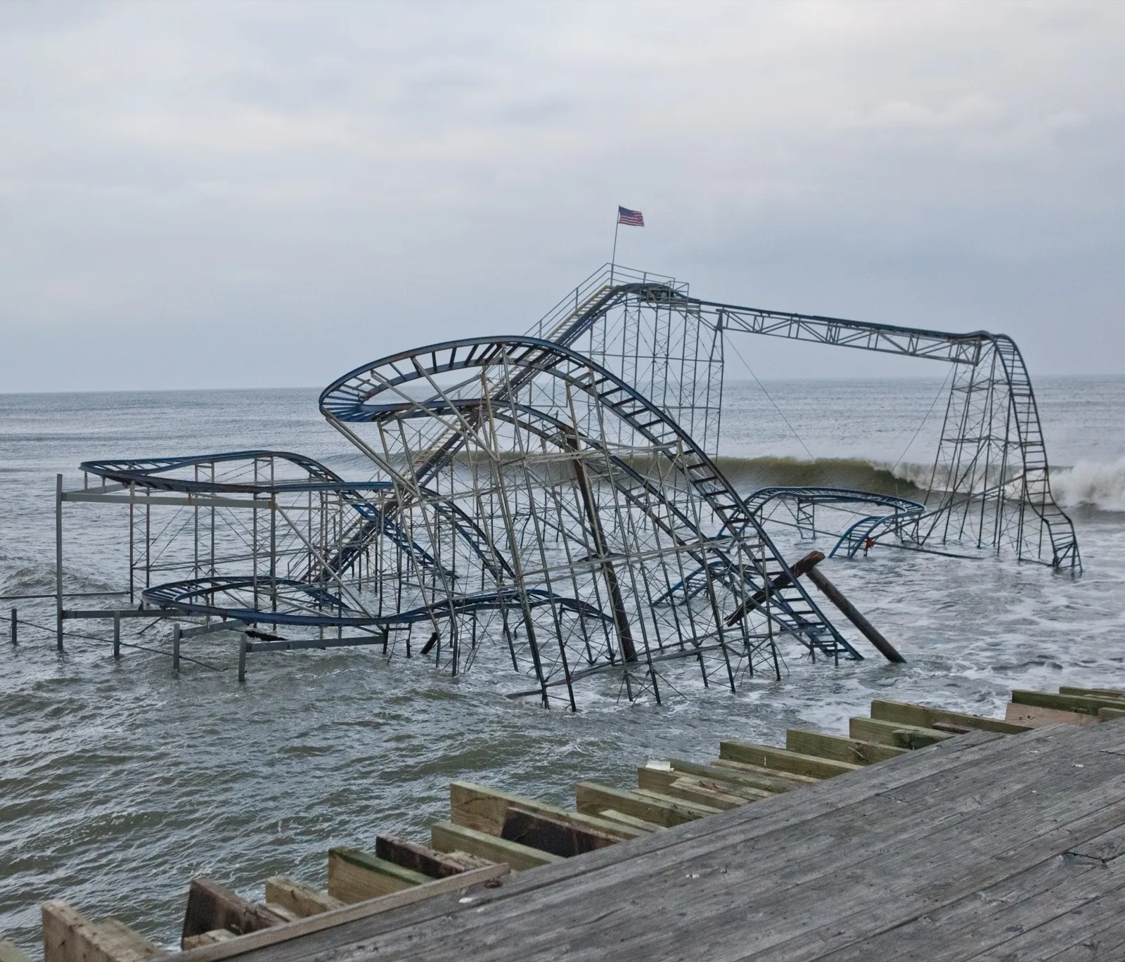 The Star Jet roller coaster standing in the surf at Seaside Heights after Hurricane Sandy