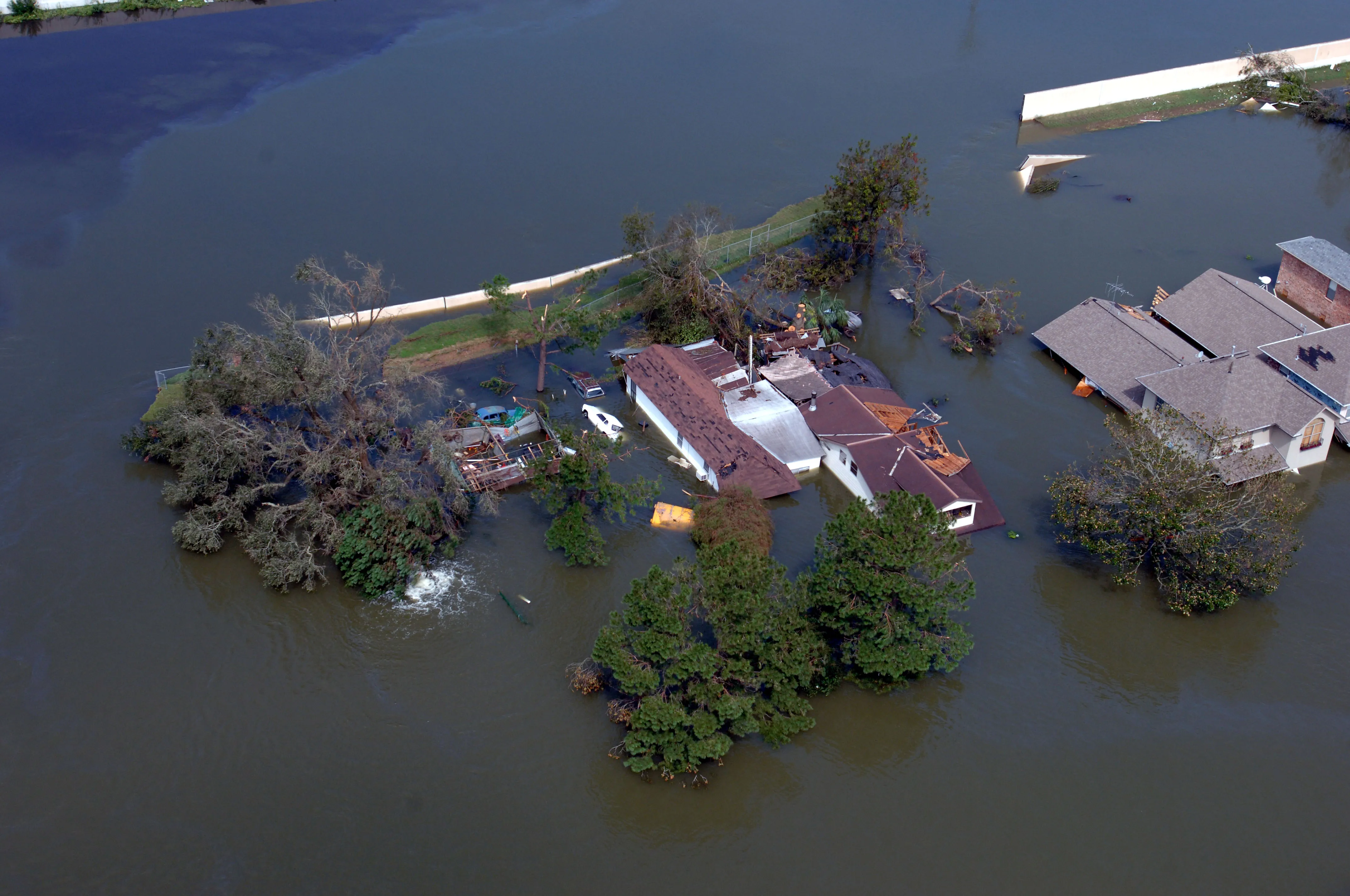 Aerial view of homes submerged and destroyed by Hurricane Katrina's floodwaters in Louisiana