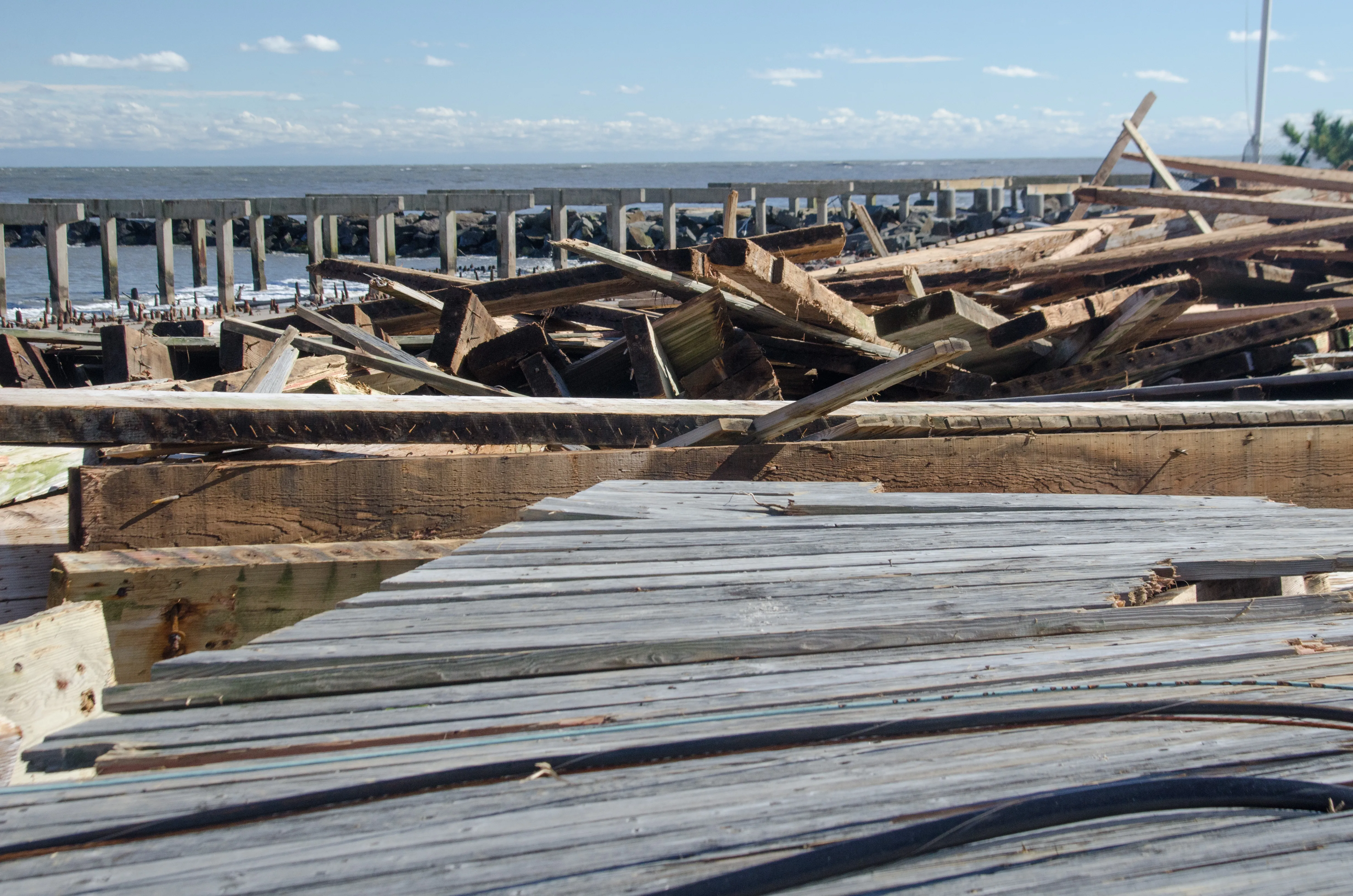 The historic Atlantic City boardwalk reduced to splintered planks after Hurricane Sandy
