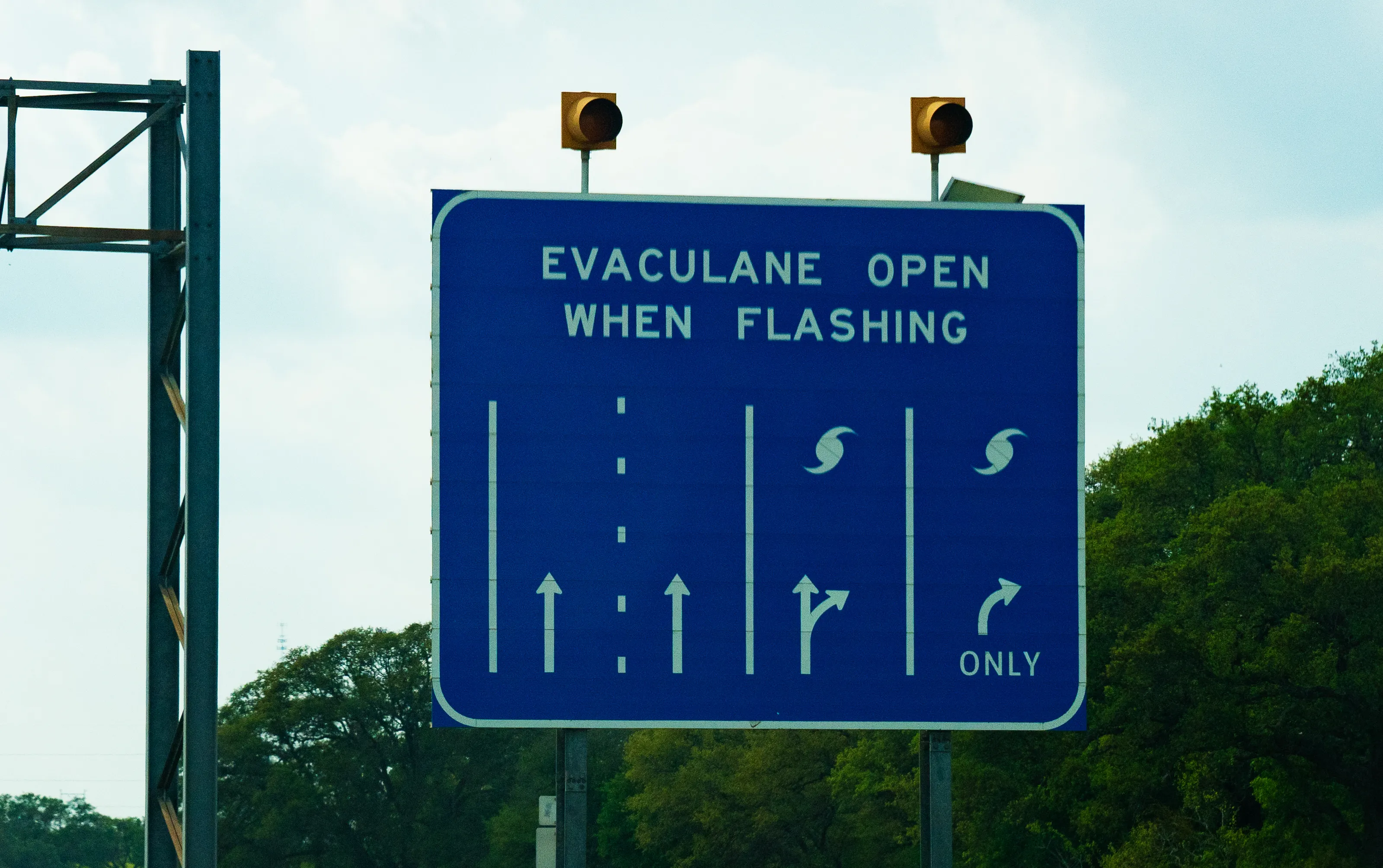 A highway with overhead signs designating contraflow hurricane evacuation lanes