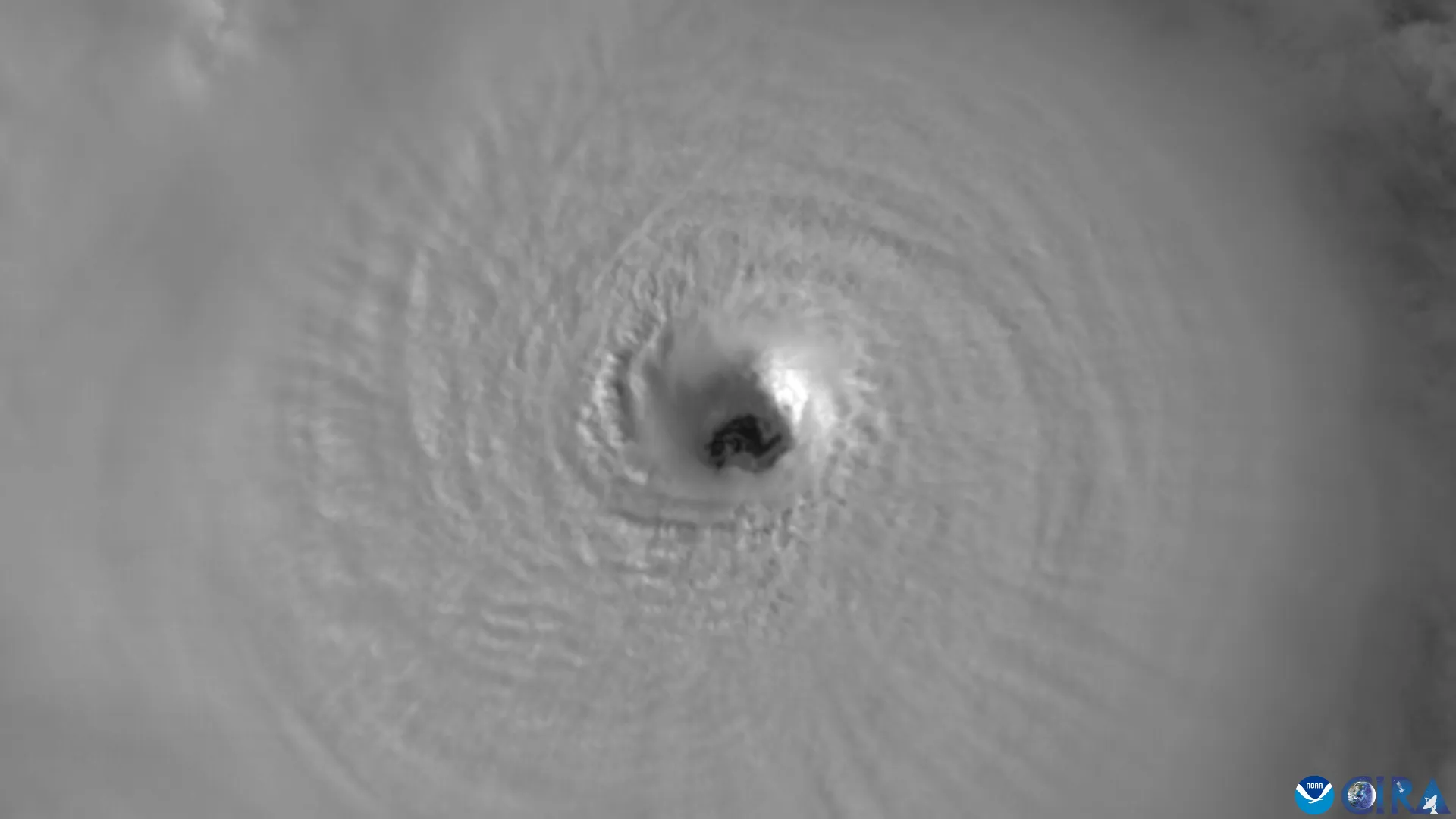 A satellite close-up of Hurricane Milton's small, sharply defined eye at peak intensity