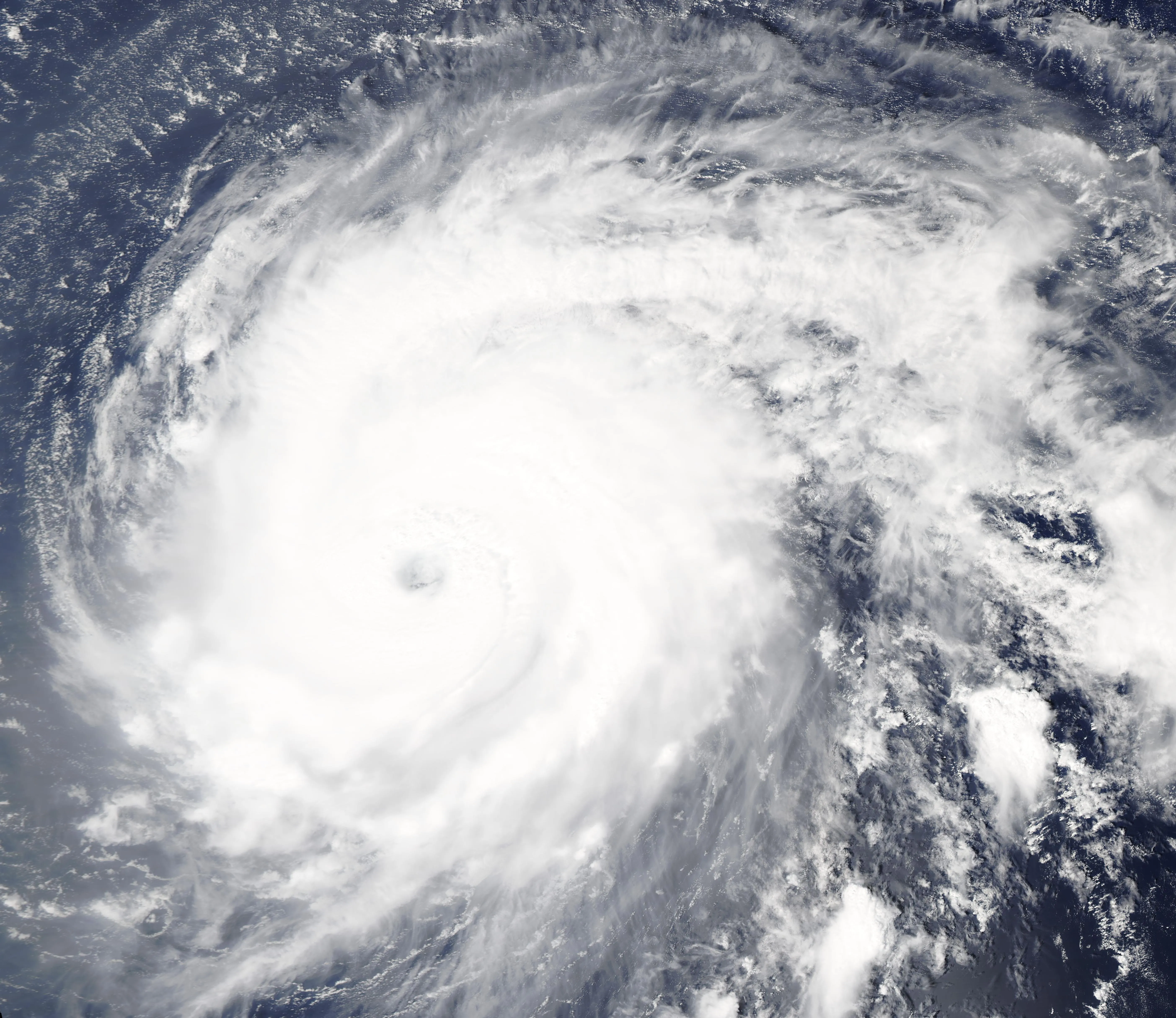 A large hurricane spinning over the open Atlantic Ocean, far from land